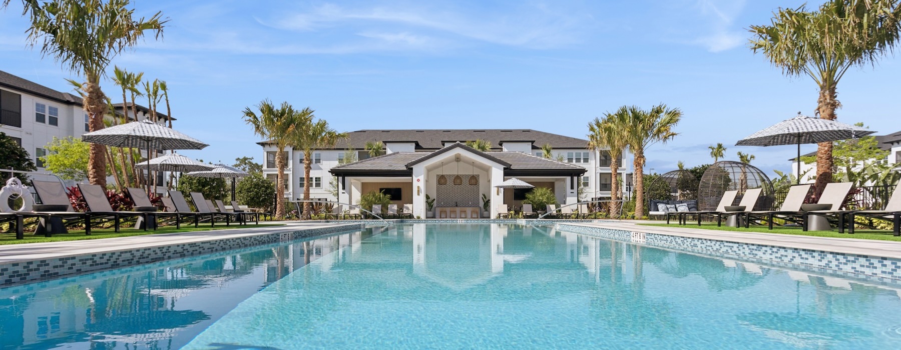 a pool with a building in the background