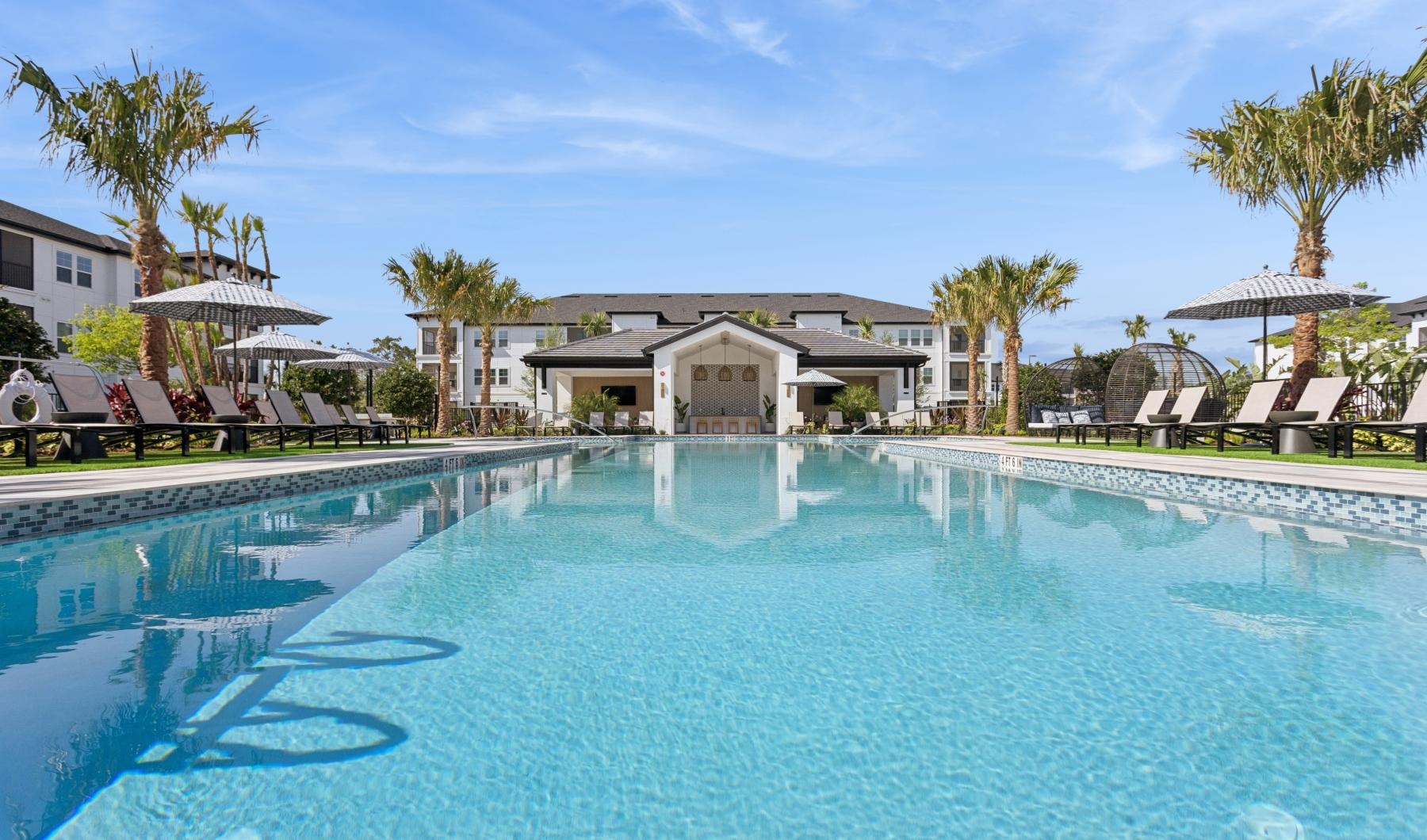 a pool with a building in the background